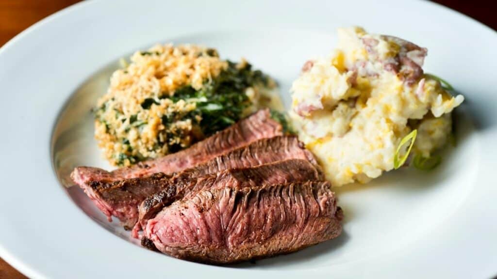 Flank steak stuffed with Parmesan lemon zest and spinach