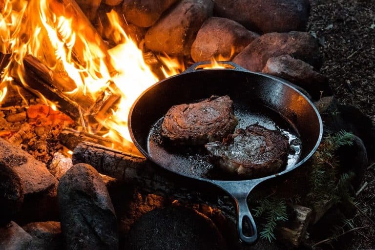 campfire with skillet on it